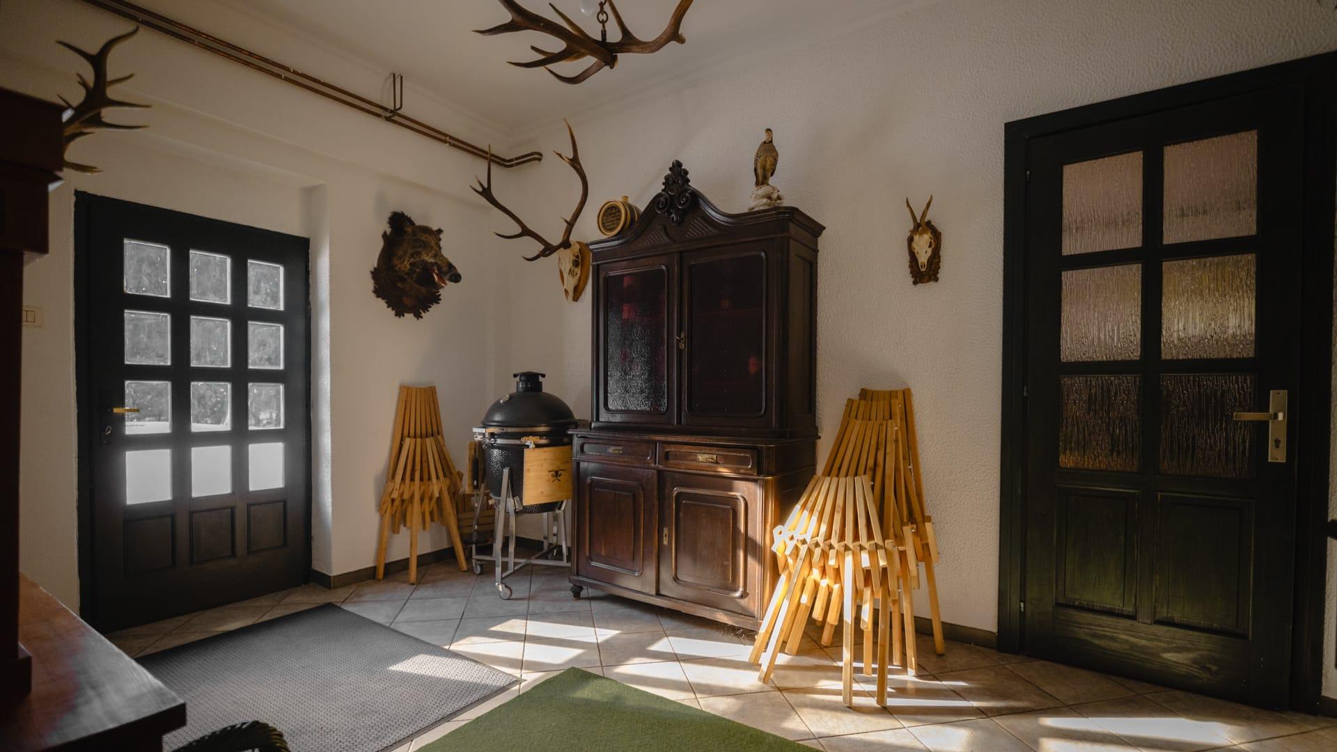 House under Javorniki background